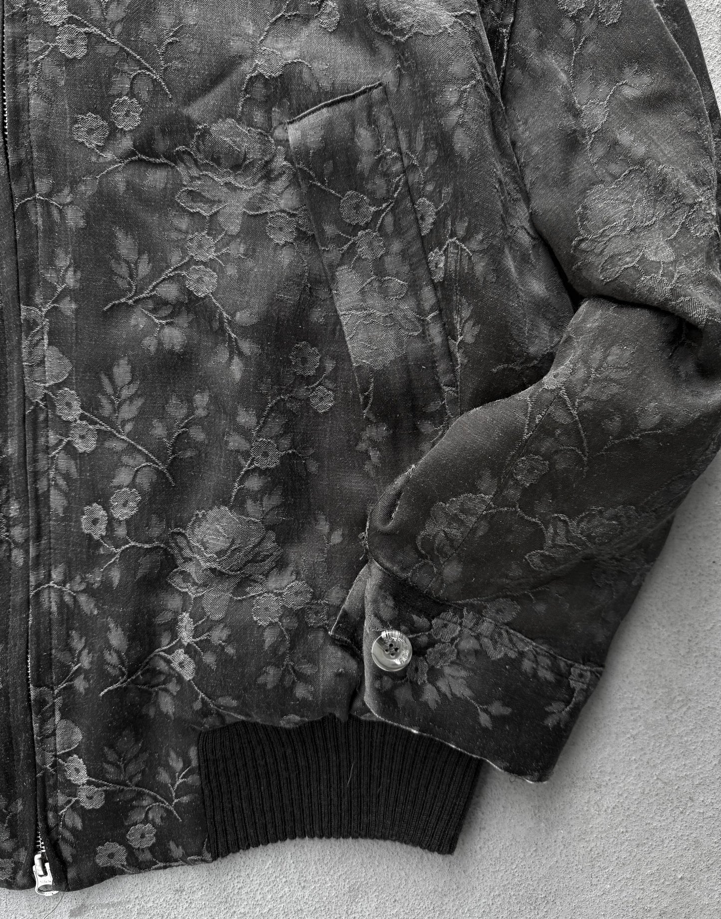 Floral patterned jacket on a plain background