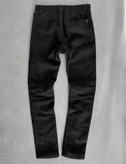 Black pants on a gray background