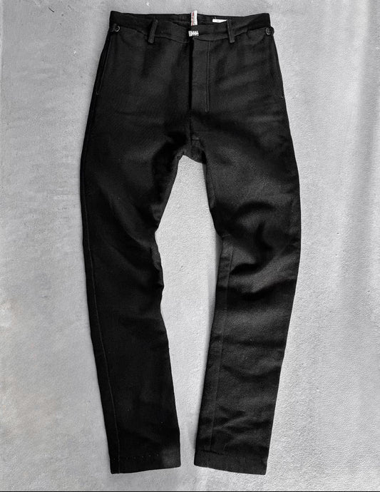 Black pants on a gray textured background