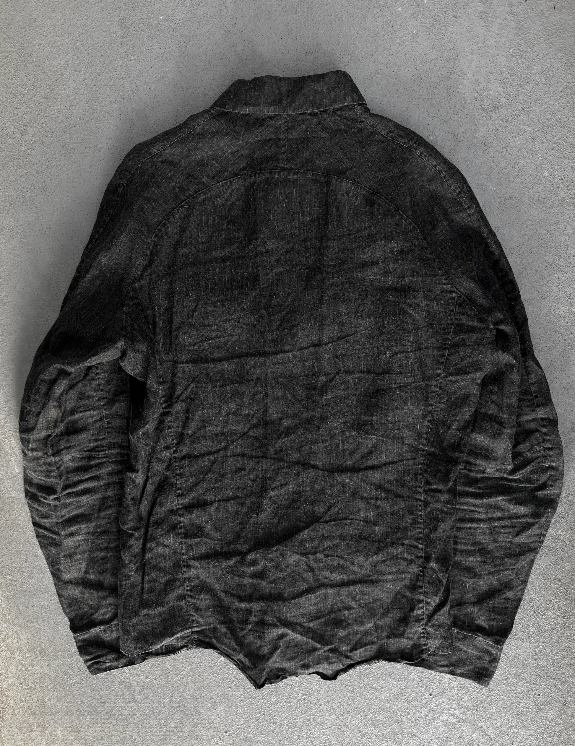 Dark jacket on a textured gray background