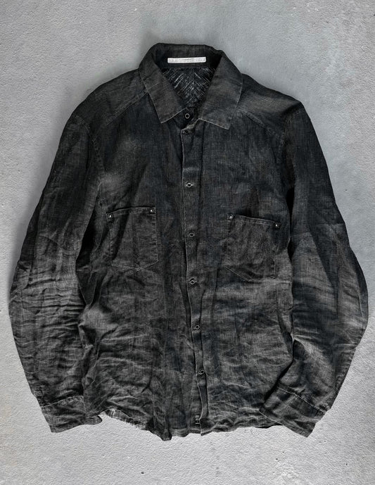 Dark gray shirt on a textured gray background