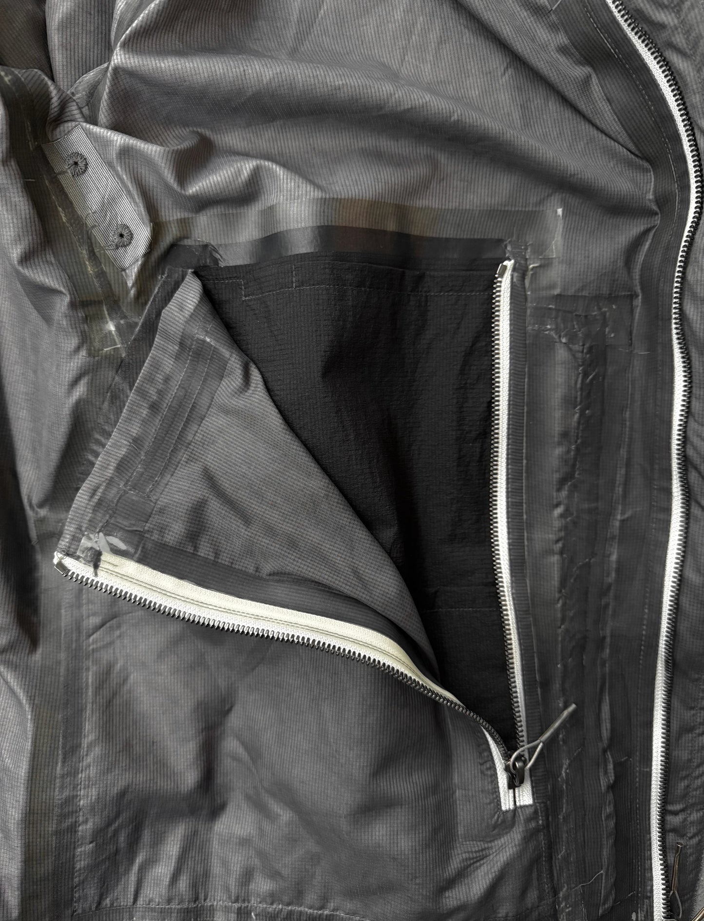 Close-up of a black jacket with a zipper