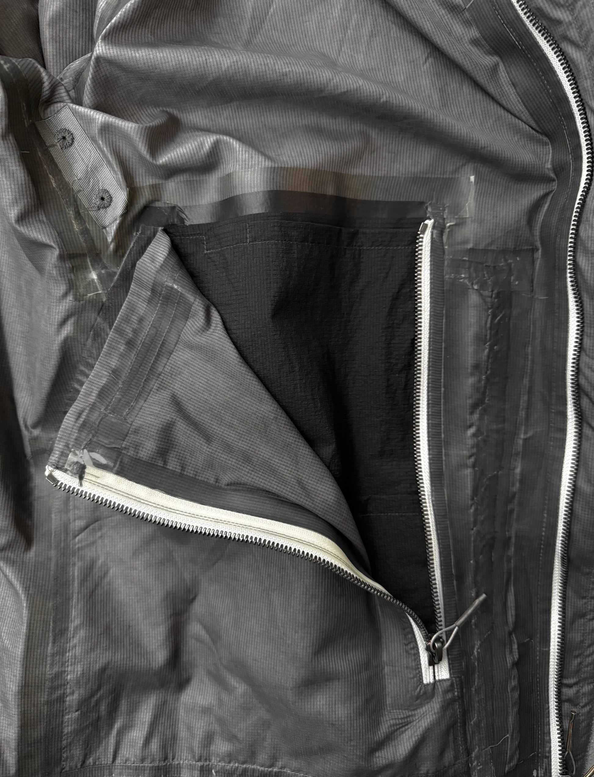 Close-up of a black jacket with a zipper