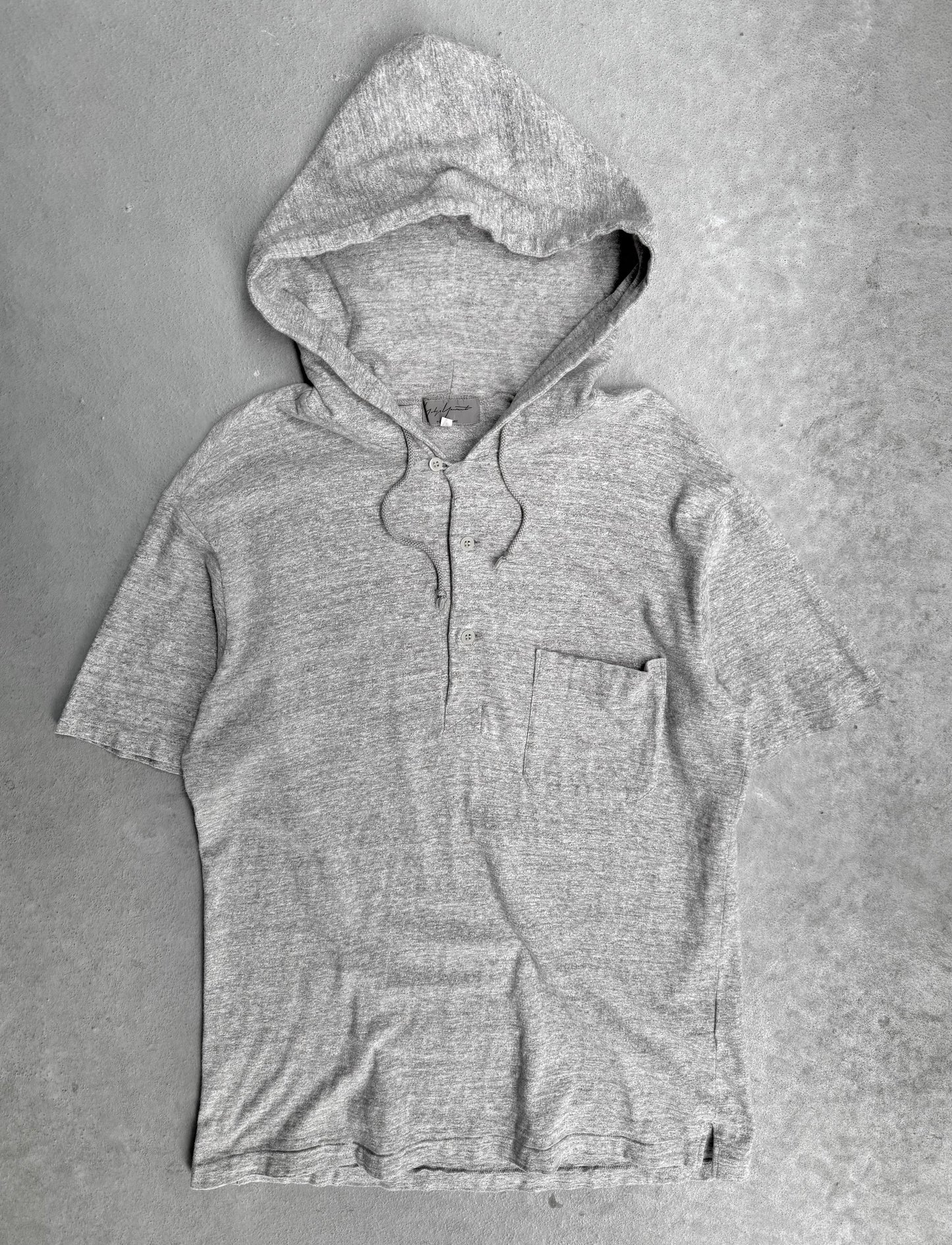 Gray hooded shirt on a gray background